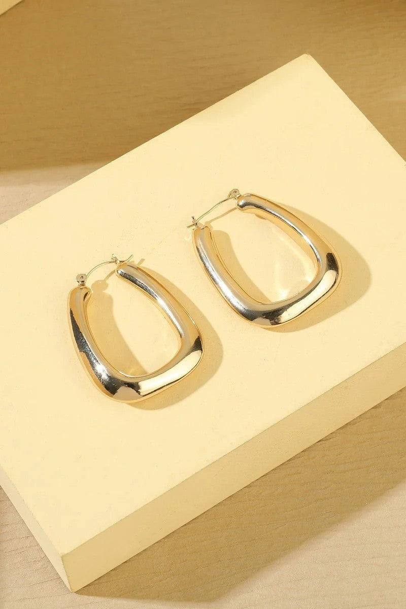 Gold Tone Diagonal Hoop Earrings – product image 2 of 2