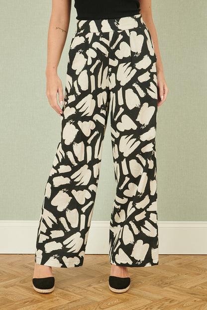 Yumi Black Cotton Splash Print Relaxed Fit Trousers – product image 2 of 4