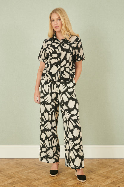 Yumi Black Cotton Splash Print Relaxed Fit Trousers – product image 4 of 4