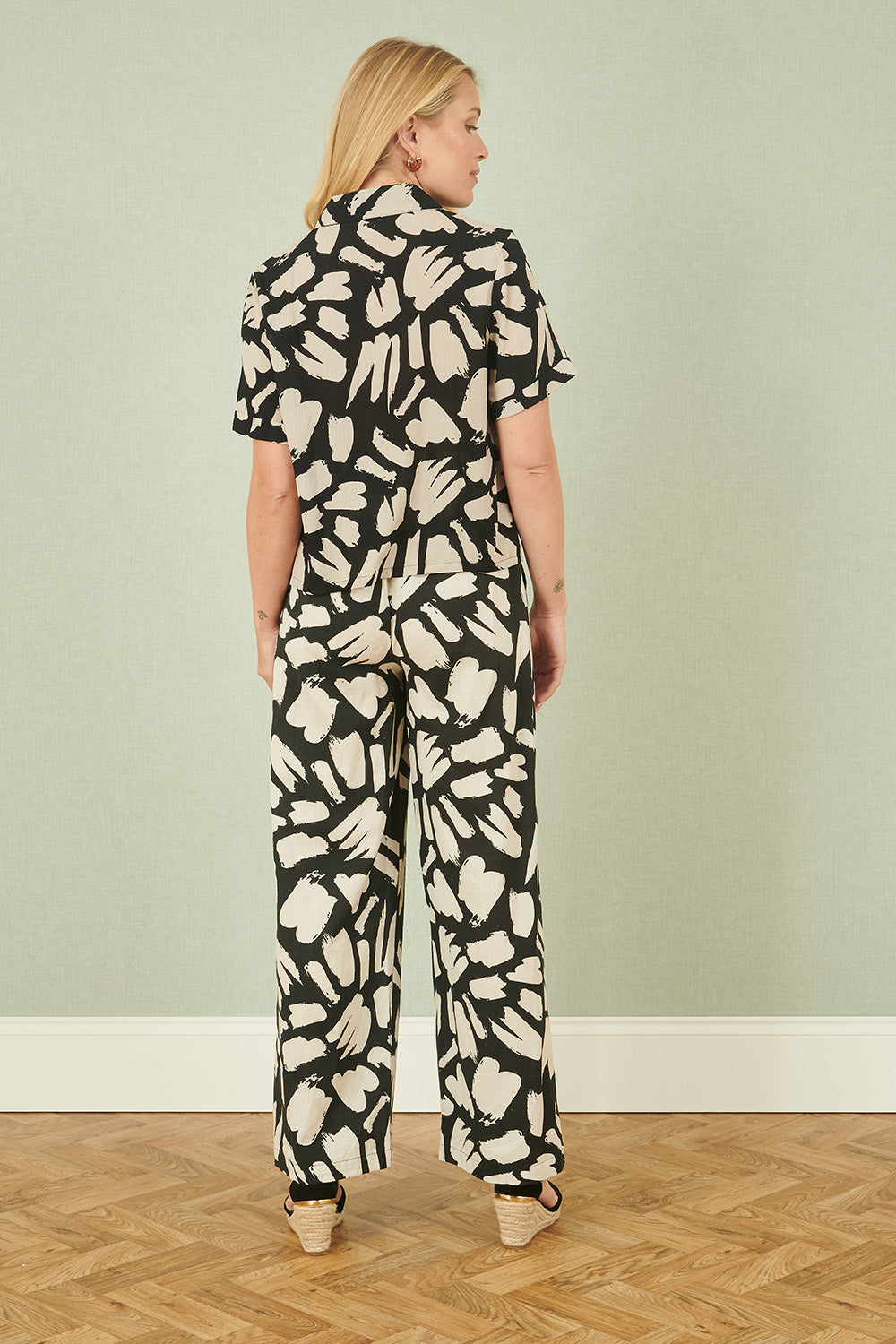 Yumi Black Cotton Splash Print Relaxed Fit Trousers – product image 3 of 4